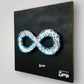 "Eternity Unveiled: Infinity Symbol Wall/Desk Accessory for Limitless Possibilities and Connectedness"